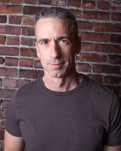 Dan Savage. - ROMAN ROBINSON