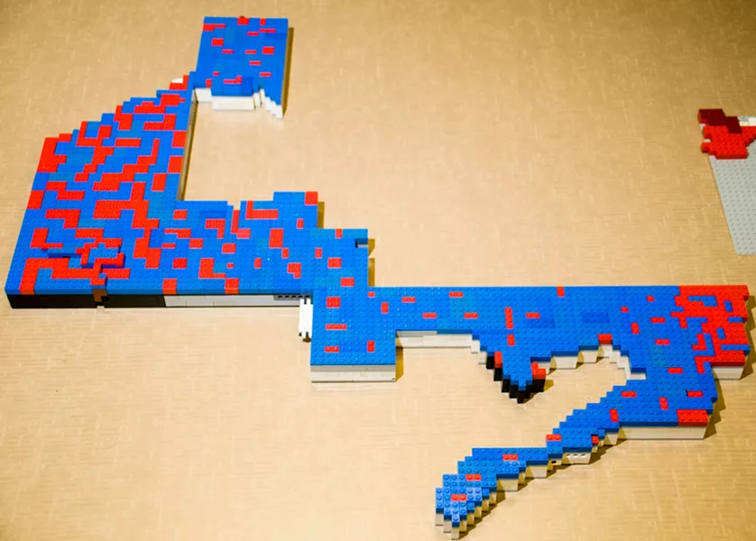 Michigan's 14th Congressional District is a zig-zag shape that includes parts of downriver, Detroit, Oak, Park, Southfield, Farmington Hills, Keego Harbor, and Pontiac. - TOM PERKINS