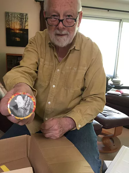 Ken Mikolowski, holding a button depicting poet Jim Gustafson’s bandaged hand, will give a talk commemorating the 50th anniversary of the Alternative Press. - COURTESY OF MEREDITH COUNTS