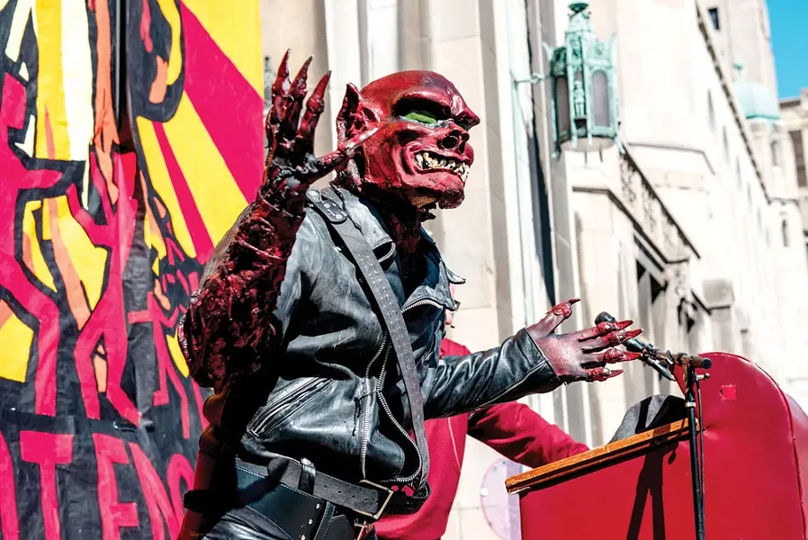 The "Red Dwarf" speaks at the Marche du Nain Rouge, 2015. - COURTESY OF MARCHE DU NAIN ROUGE