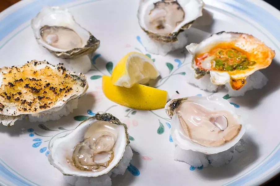 Island Creek oysters at Mabel Gray. - TOM PERKINS
