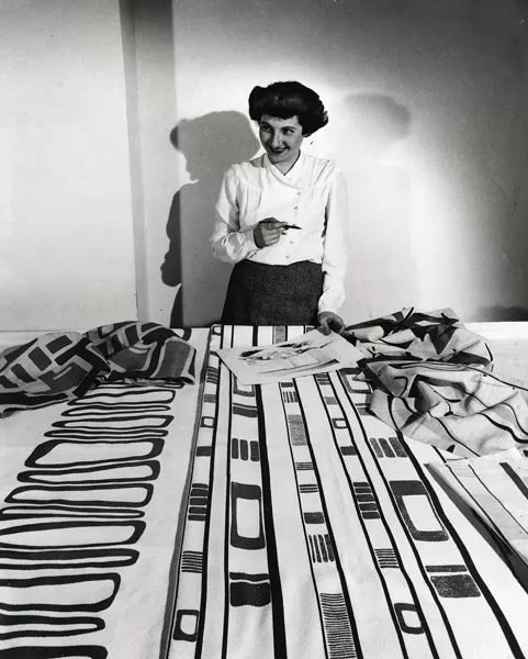 Ruth Adler Schnee working with designs. - COURTESY OF CRANBROOK ART MUSEUM