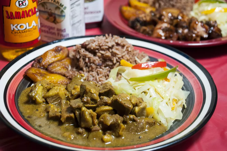 Curry goat at Jamaican Pot. - PHOTO BY TOM PERKINS