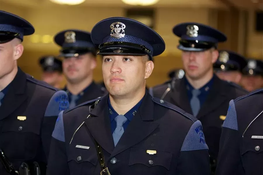 Mark Bessner’s Michigan State Police graduation ceremony in 2012. - MICHIGAN STATE POLICE FACEBOOK