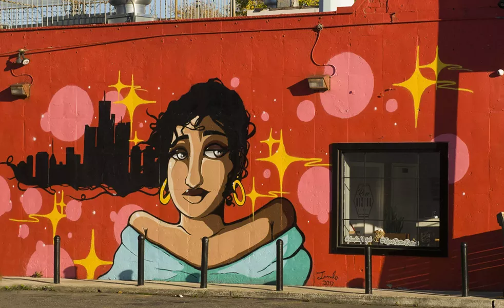 A mural on River Bistro's wall. - TOM PERKINS