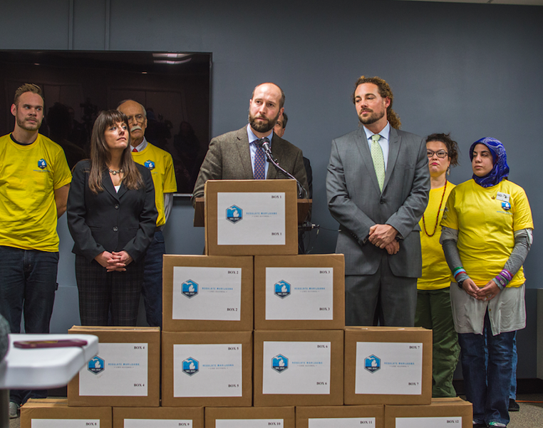 The Coalition to Regulate Marijuana Like Alcohol submits 365,000 petition signatures in support of marijuana legalization to the state Board of Canvassers on Nov 20, 2017. - COURTESY PHOTO