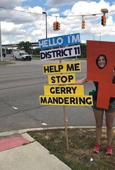 A Voters Not Politicians volunteer dressed up as a gerrymandered district.