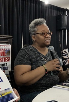 Tawana Petty, data justice director of the Detroit Community Technology Project, speaks at the town hall. Also pictured is Clare Garvie, a senior associate at Georgetown Law's Center on Privacy and Technology.