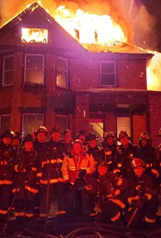 Detroit firefighters disciplined for posing in front of burning house