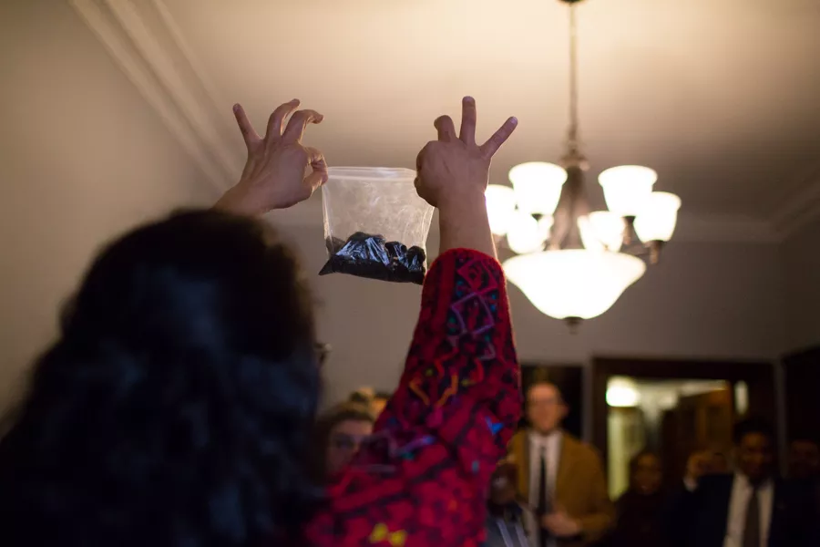 “You see this?” Tlaib says, holding up a plastic bag containing a byproduct called petcoke, which she was amused to find had been packed along with her belongings from her Detroit office. “Some of you don’t know what this is. It’s part of why we’re here now.” - In her battle over the petcoke, Tlaib took samples from the piles that were stored along the Detroit River and had them tested. They turned out to be toxic, despite assurances from officials stating otherwise. Thanks to Tlaib, the piles of petcoke were later covered up. - ERIK PAUL HOWARD