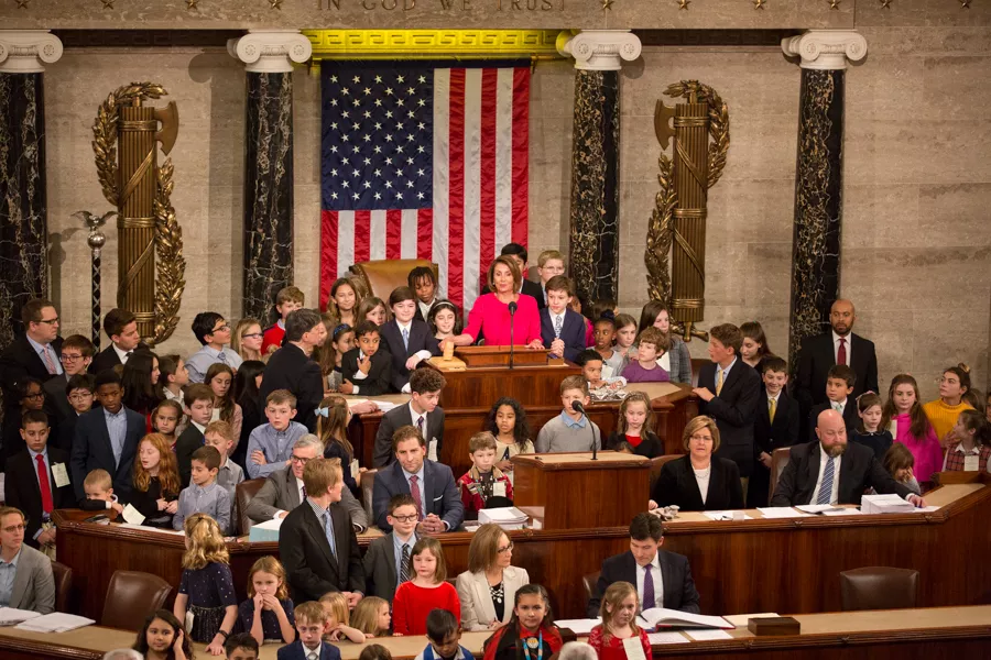 Speaker Nancy Pelosi invites all children present up to the podium as she convenes the 116th Congress for the first time. - ERIK PAUL HOWARD