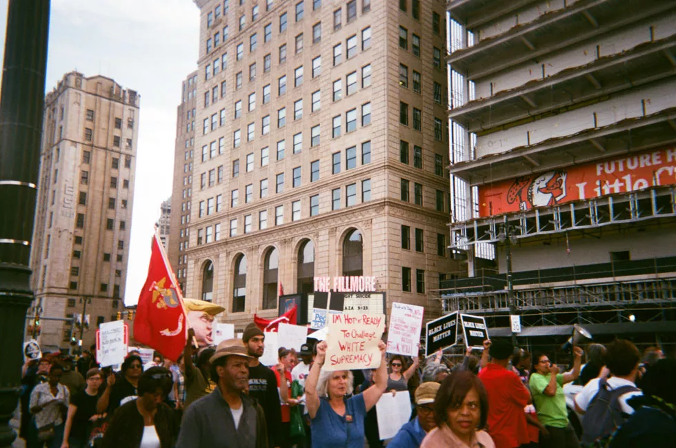 Protesters take to the street before the first of Kid Rock’s six shows at Little Caesars Arena. - JERILYN JORDAN