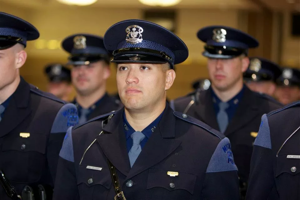 Mark Bessner’s Michigan State Police graduation ceremony in 2012. - MICHIGAN STATE POLICE FACEBOOK