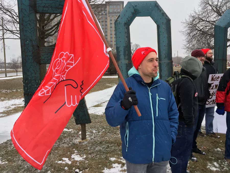 A DSA member stands in solidarity with immigration activists at a January demonstration in Detroit to urge Congress to pass the Dream Act. - VIOLET IKONOMOVA