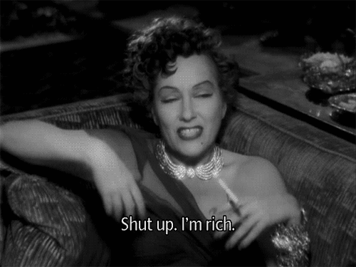 Giphy animated gif of Gloria Swanson as Norma Desmond saying 'Shut up, I'm Rich.