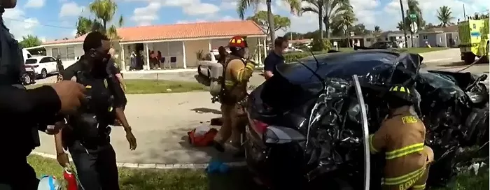 Four-year-old Taylor Bishop was pulled out by first responders and taken to Memorial Regional Hospital, where he died less than an hour after the accident. - BODY-WORN-CAMERA STILLS VIA PEMBROKE PINES POLICE DEPARTMENT