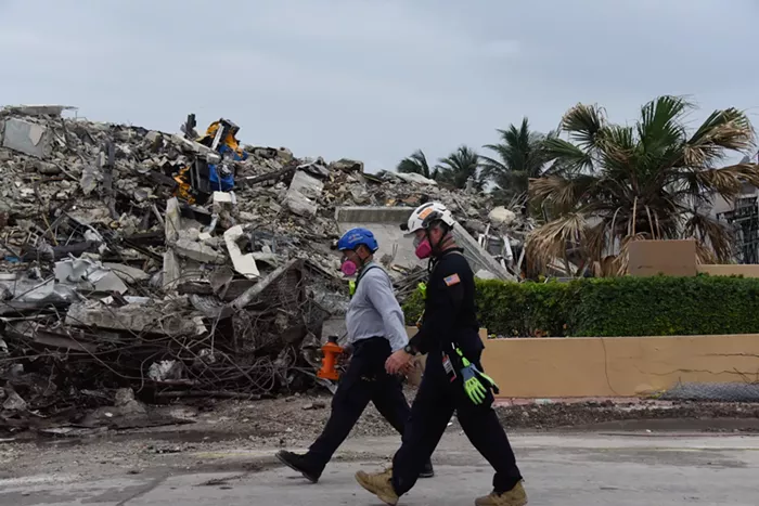 The remains of 98 people were recovered in the days and weeks that followed the collapse. - PHOTO BY MICHELE EVE SANDBERG