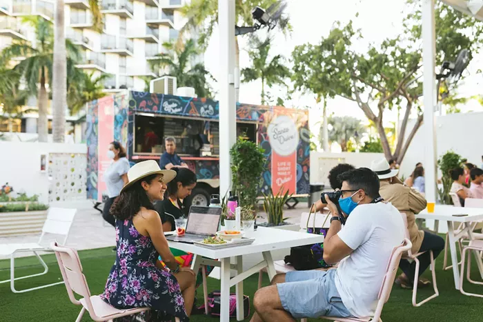 The sound system and permanent stage make musical performances the focal point of the Backyard. - PHOTO BY @JACKIEBPHOTO