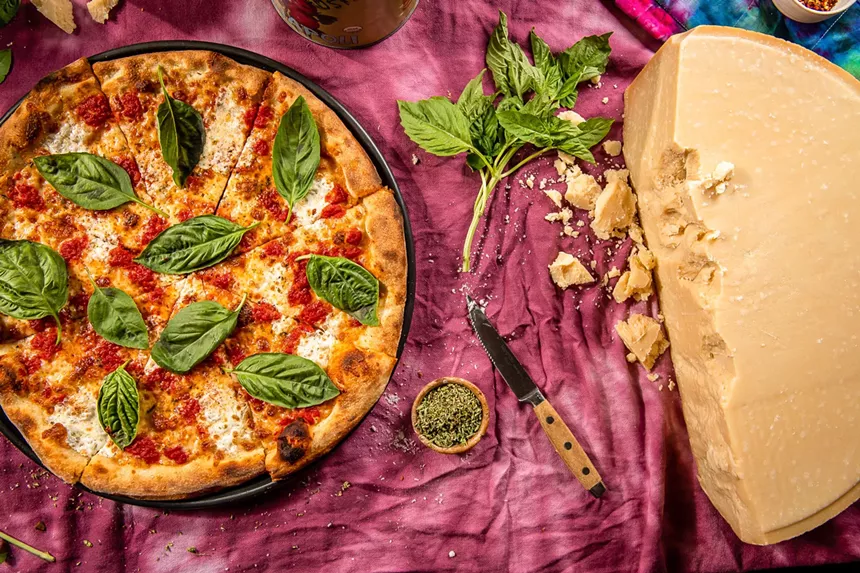 Get 50 percent off cheese slices on National Cheese Pizza Day (Sunday). - PHOTO COURTESY OF ELEVENTH STREET PIZZA