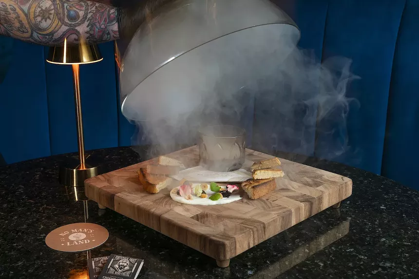 The "Foie Gras 'Old Fashioned'" is a visual spectacle at No Man's Land. - PHOTO BY SHELBY COOPER