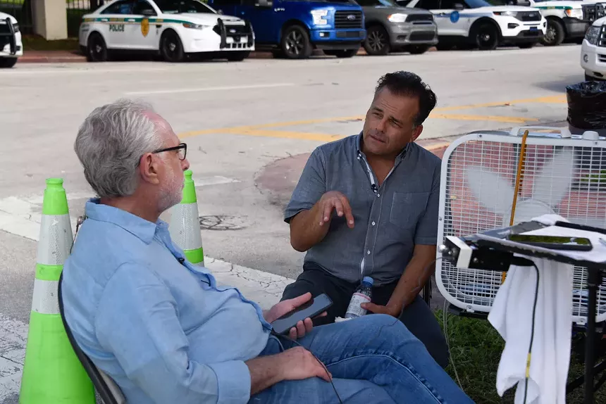 CNN reporter Wolf Blitzer speaks with architect Kobi Karp on Sunday, June 27. - PHOTO BY MICHELE EVE SANDBERG