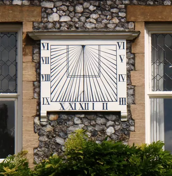 10:15 a.m. in Norwich, UK -- except you have to adjust for the "equation of time" if it's not around March 21 or September 21. Don't forget daylight saving! - BARRY EVANS