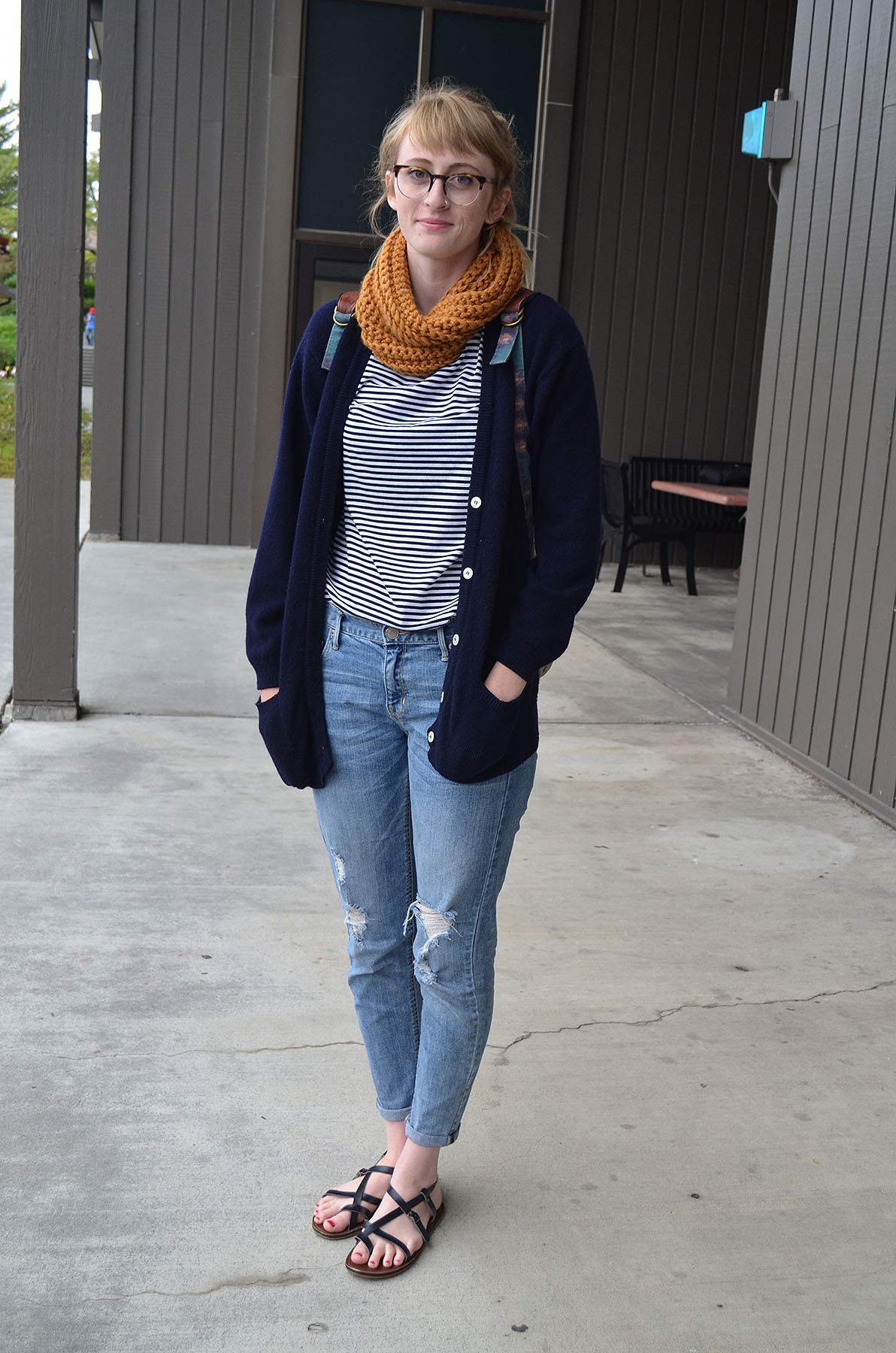 Billie, a senior art student from Salinas, says Humboldt's weather is "amazing." She's ready for it in a Paris-meets-redwoods, thrifted, handmade scarf, sandals and jeans from a free pile. - PHOTO BY SHARON RUCHTE