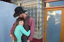 PHOTO BY GRANT SCOTT-GOFORTH - Brett and Julia McFarland outside the Journal office.