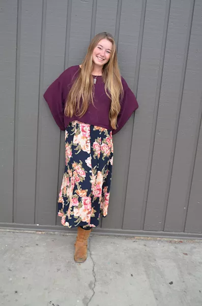 Cara Cannon, a senior from Chico who's studying child development, is wearing her mom's dress, a homemade necklace and a blouse from the thrift shop. - PHOTO BY SHARON RUCHTE
