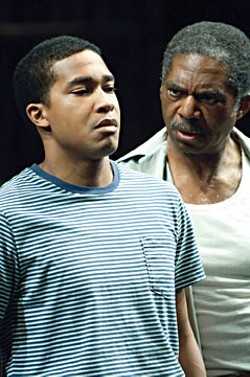 Cory (Cameron Knight, left) gets a stern lecture from his father Troy (Charles Robinson) in the Oregon Shakespeare Festival production of August Wilson's Fences. Photo by Jenny Graham.