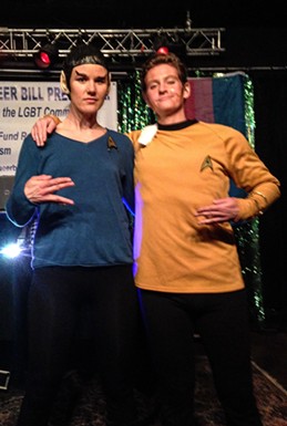 Costume contest winner Spock and Drag War runner-up James T. Kirk throw their signs. - JENNIFER FUMIKO CAHILL