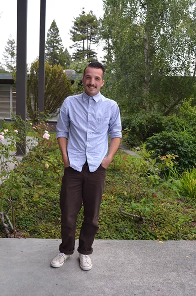 David Ball, a San Diego senior studying art education feels a little freer to express himself here, as he does in this sharp, blue button-up and Converse sneakers. - PHOTO BY SHARON RUCHTE