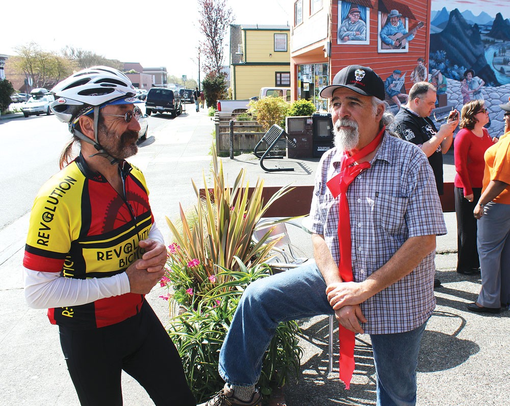 Former Arcata Mayor &quot;Bad&quot; Bob Ornelas chats with Los Bagels owner Dennis Rael at a ribbon-cutting ceremony marking the business' 30th anniversary. - PHOTOS BY BOB DORAN