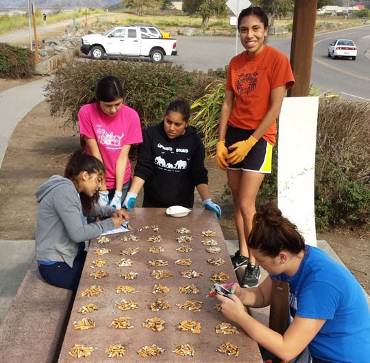 FUHS APES team counting cigarette butts. - PHOTO COURTESY PAM HALSTEAD