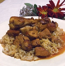 PHOTO BY PERI ESCARDA - Hearty adobo over brown rice to warm you.