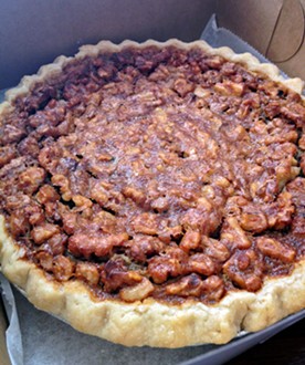 Kentucky Derby pie comes with a kick of Bourbon. - JENNIFER FUMIKO CAHILL