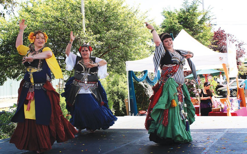 Kristie Alberti, Amanda Loftis and Megz Madrone of Tribal Oasis Belly Dance were among the scores of entertainers on Saturday, May 17, the first day of the Humboldt Arts Festival at Arcata's Creamery District. - PHOTOS BY BOB DORAN