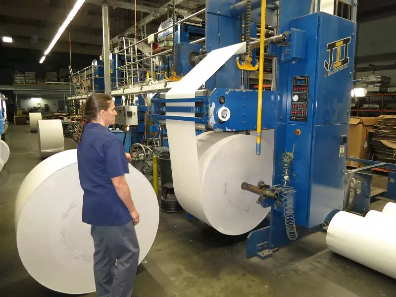 Lea Shapiro ready to hang a new roll on the splicer. - BARRY EVANS
