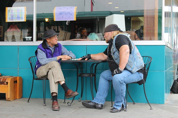 Stan Elsworth, described as his producer as a "big, burly biker dude" with an interest in history, talks with local historian Ray Hillman in Eureka. - THADEUS GREENSON