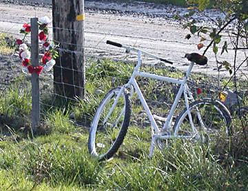 The "ghost bike" installed in 2008 on the side of State Route 299 where cyclist Greg Jennings was killed by a car that traveled onto the shoulder where he was riding. - PHOTO BY HEIDI WALTERS