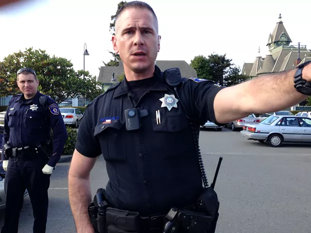 Officer Drake Goodale, as he successfully shuts down photography in a public place. - PHOTO BY CARRIE PEYTON DAHLBERG