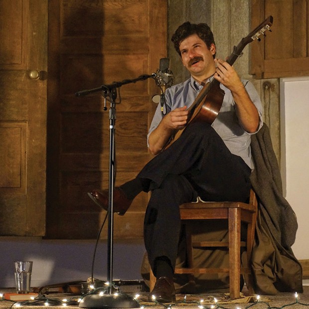 Old-time fiddler, banjo player and guitarist Frank Fairfield picks out a tune in a solo concert at The Sanctuary in Arcata on July 6. - PHOTO BY BOB DORAN