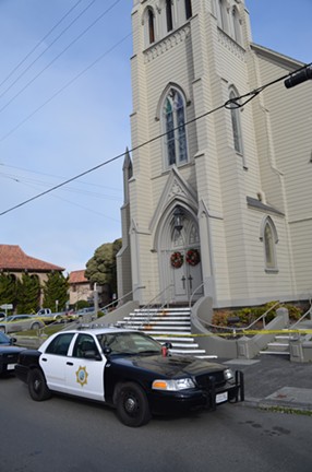 Police have roped off St. Bernard's Church and the neighboring rectory, where Pastor Eric Freed was found dead this morning. - GRANT SCOTT-GOFORTH