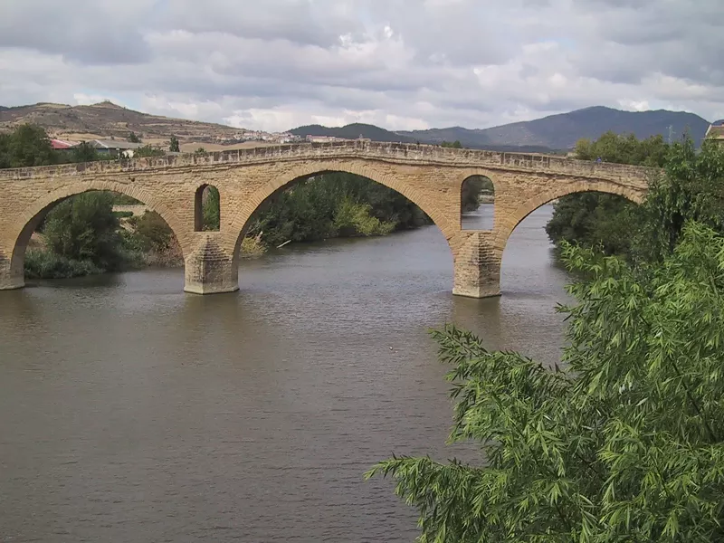 Puente La Reina marks the approximate western boundary of Spain's Basque Country (Euskal Herria). The bridge was built in the middle ages across the river Arga for Camino de Santiago pilgrims.