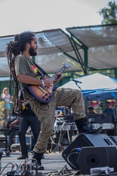 Eduardo Schach-Bonit of I-Kronik jamming out at the 30th Annual Reggae On The River 2014, Friday Aug. 1. - ALEXANDER WOODARD