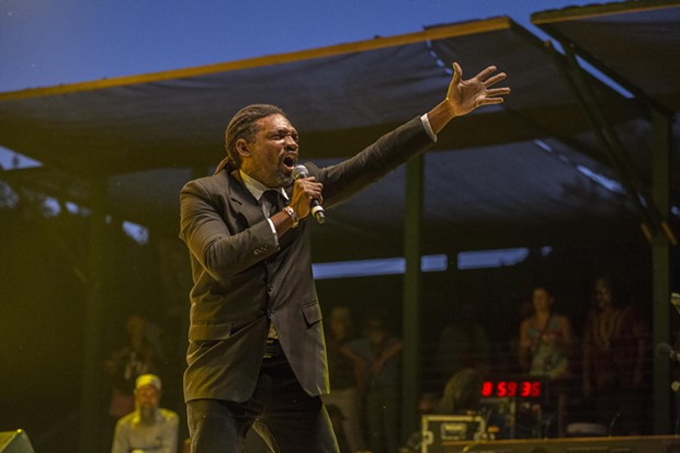 Peter "Peter G" Gayle performing with Sly & Robbie and the Taxi Gang at the 30th Annual Reggae On The River 2014, Friday Aug. 1.