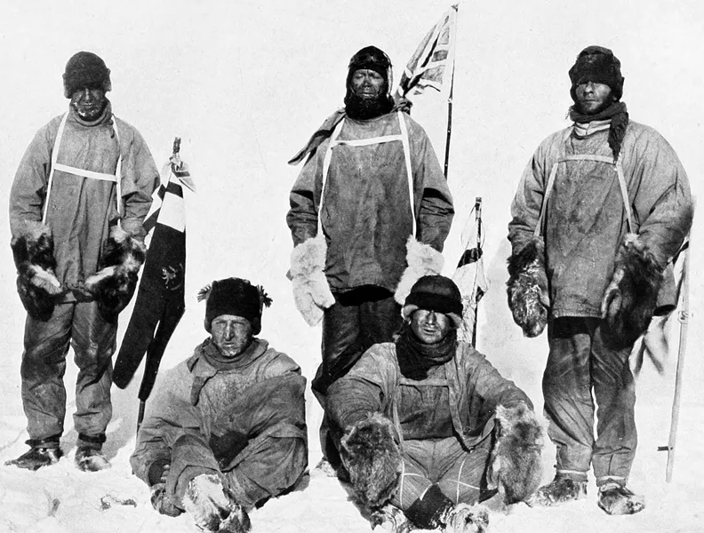 Scott and companions at the South Pole, Jan. 18, 1912, the day after they discovered they'd been beaten by Amundsen. L-R: Lawrence Oates, Henry Bowers (pulling string to operate the camera shutter), Scott, Dr. Edward Wilson, Edgar Evans. - PUBLIC DOMAIN