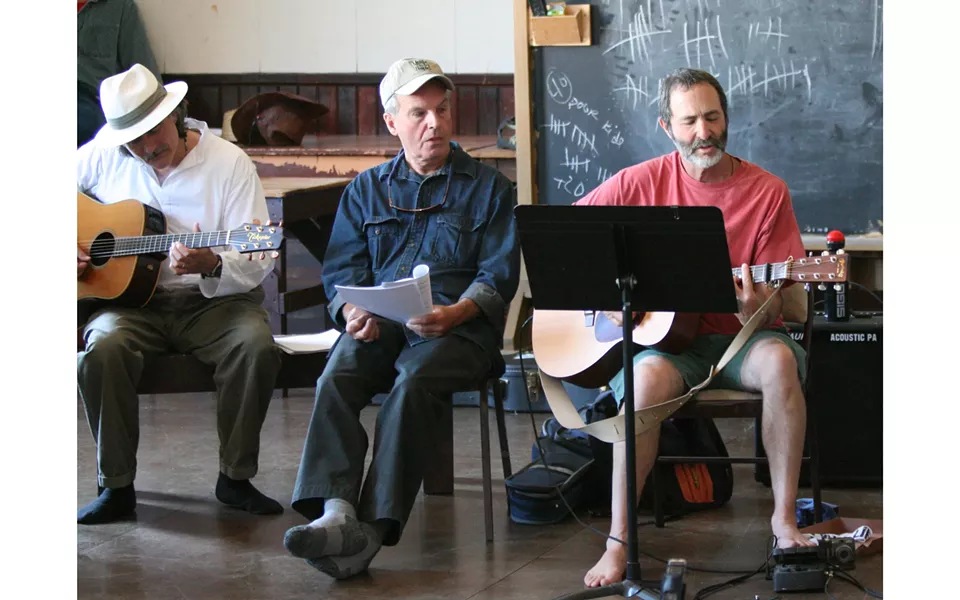 Seabury Gould (right) and Joel Sonenshein lead last year's Beatles Sing-along - PHOTO BY BOB DORAN