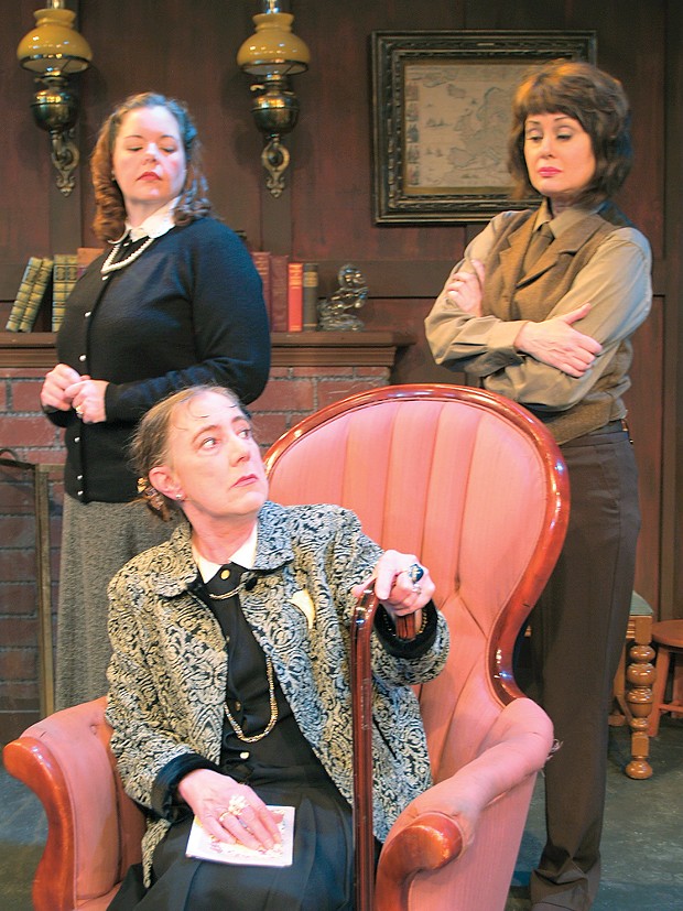 Shannan Dailey as Mollie (standing, left), Toodie Boll as Mrs. Boyle (seated), and Gloria Montgomery as Miss Casewell in NCRT’s Mousetrap. - PHOTO COURTESY OF NCRT