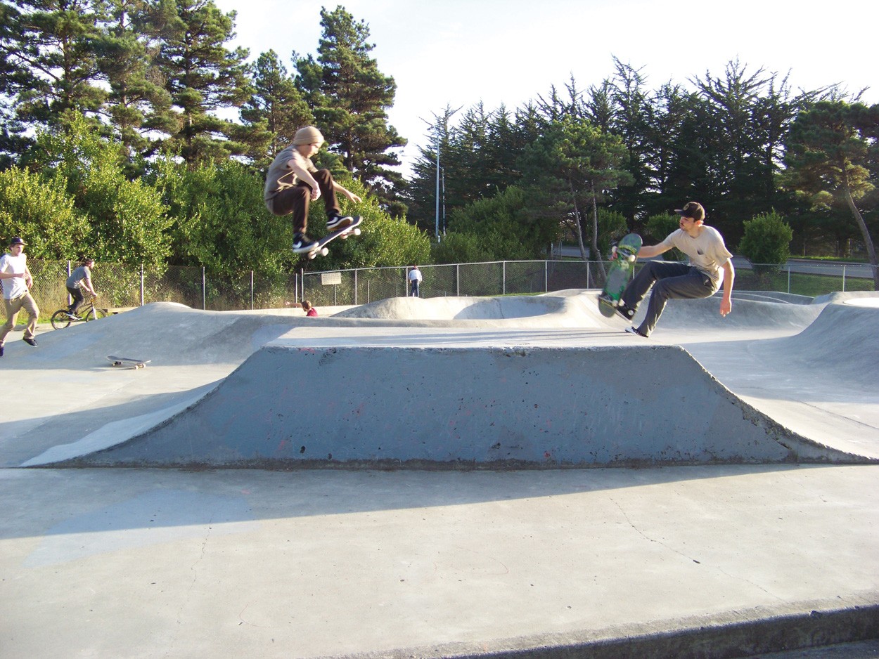 Timothy Garcia, left, and Vincent Peinado on the pyramid at the Arcata Skate Park. - PHOTO BY HEIDI WALTERS